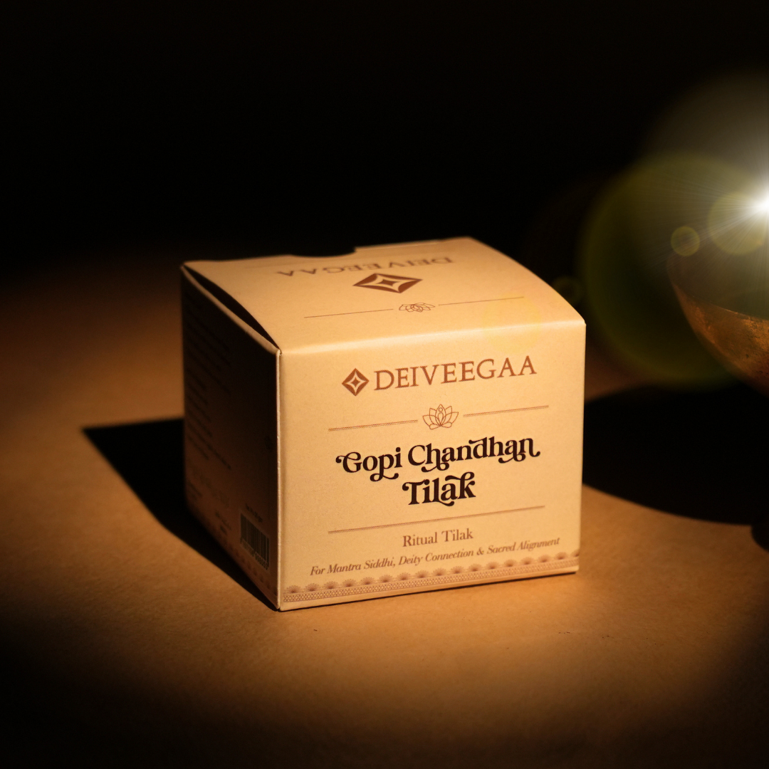 Deiveegaa Gopi Chandhan Tilak white product box on a dark background