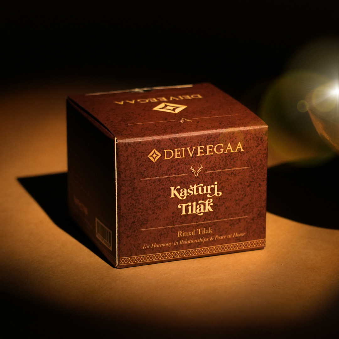 Deiveegaa Kasturi Tilak brown product box on a dark background